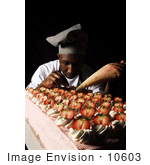 #10603 Picture Of A Man Frosting Cakes