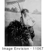 #11067 Picture Of A Woman With A Rake