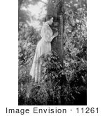 #11261 Picture Of Helen Keller Resting Against A Tree