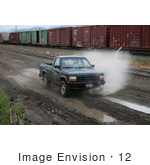 #12 Picture Of An Off-Road Enthusiast Driving Through Muddy Terrain