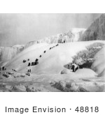 #48818 Royalty-Free Stock Photo Of People Climbing A Snowy Hill To The Icy Niagara Falls