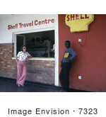 #7323 Picture Of A Man And Woman Standing Outside Of A Shell Gas Station Where Two People Became Ill With The Marburg Virus