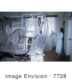 #7728 Picture Of South African Virologist Adjusting Plastic Ebola Virus Isolators