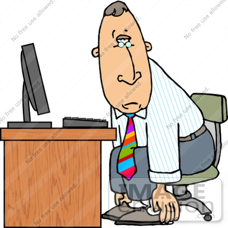  Business Man Slouching While Sitting at a Computer Desk at Work