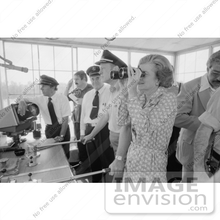 #2525 Gerald Ford Piloting a Riverbot, Betty Ford Looking Through Binoculars by JVPD