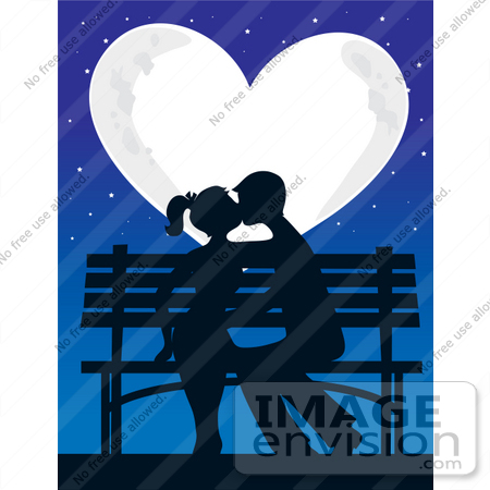 couple kissing silhouette image. A Silhouetted Teen Couple