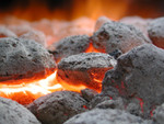Free Picture of Charcoal Briquettes Burning in a BBQ Grill