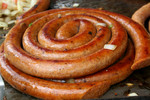 Free Picture of Polish Sausage Cooking On a Grill