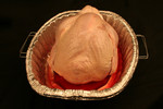 Free Picture of Backside of a Uncooked Thanksgiving Turkey in a Pan