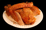 Free Picture of Turkey Drumstick, Wing, White Meat, and Dark Meat on a Plate