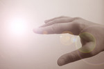 Free Picture of Hand Reaching For an Orb