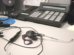 Free Picture of Headset and Phone on an Office Desk