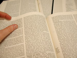Free Picture of Person Reading Information in an Encyclopedia
