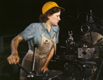 Free Picture of Lathe operator machining parts for transport planes at the Consolidated Aircraft Corporation plant
