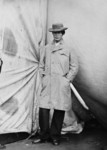 Free Picture of Lewis Payne Standing in an Overcoat and Hat