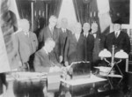 Free Picture of Coolidge Signing the Mellon Tax Bill