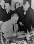 Free Picture of President Roosevelt Signing the Declaration of War Against Japan