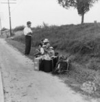 Free Picture of Hitchhiking Family