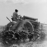 Free Picture of Man Riding a Tractor