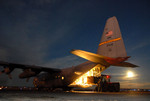 Free Picture of Loading Hay Into C-130 Hercules