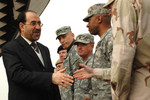 Free Picture of Iraqi Prime Minister Nouri al-Maliki Shaking Hands