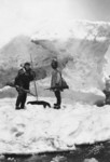 Free Picture of Eskimo and Man in Winter Scene