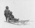 Free Picture of Couple on a Dog Sled