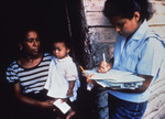 Free Picture of Public Health Advisor Interviewing a Resident that Lives in a Disease Stricken Community