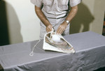 Free Picture of Researcher Preparing a Block of Dry Ice that will be used to Attract Mosquitoes for Arbovirus Studies - 1980