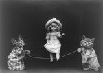 Free Picture of Cats Playing Jump Rope With Doll