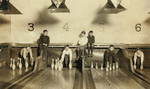 Free Picture of Boys Working in Bowling Alley