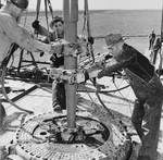 Free Picture of Oil Drillers Using Tongs
