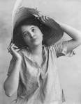 Free Picture of Woman Wearing Battered Straw Hat