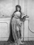 Free Picture of Woman Leaning on a Mantle