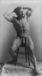 Free Picture of Eugen Sandow Sitting on a Stool