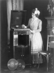 Free Picture of Woman Playing a Record on Phonograph