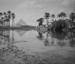 Free Picture of Village, Palm Grove and Egyptian Pyramids