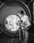 Free Picture of Technician Setting up RCA Television Camera