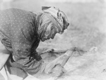 Free Picture of Blackfoot Native Fleshing a Hide