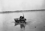 Free Picture of Mandan Indian Rowing a Bull Boat
