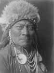 Free Picture of Crow Indian Man Called One Blue Bead