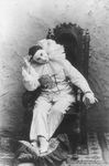 Free Picture of Pilar Morin as a Clown, Slouching in a Chair