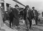 Free Picture of Two Men Carrying Confiscated Liquor During Prohibition