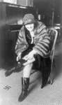 Free Picture of Woman Hiding a Flask in Her Boot During Prohibition