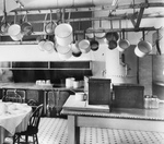 Free Picture of Pot Rack and Tables in a Kitchen