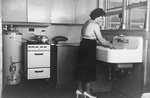 Free Picture of Woman in Her Kitchen