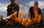 Free Picture of Sailors Using Lighter Fluid