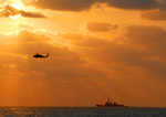 Free Picture of Helicopter and Aircraft Carrier
