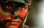 Free Picture of Female Soldier With Face Paint