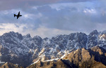 Free Picture of C-130 Hercules by Mountains